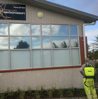 An image of Affordable Waterblasters cleaning a local business